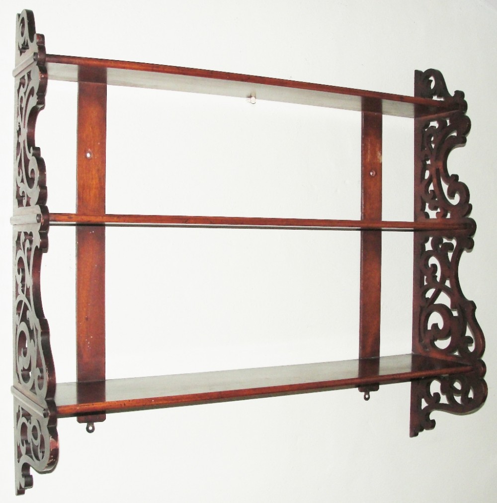 Early Victorian mahogany hanging shelves. Circa 1845