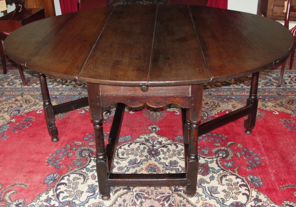 Large Georgian oak gateleg dining table. Circa 1750
