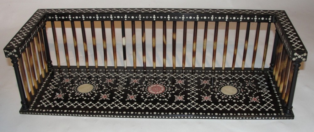 Victorian ebony and porcupine quill book rack. Circa 1870