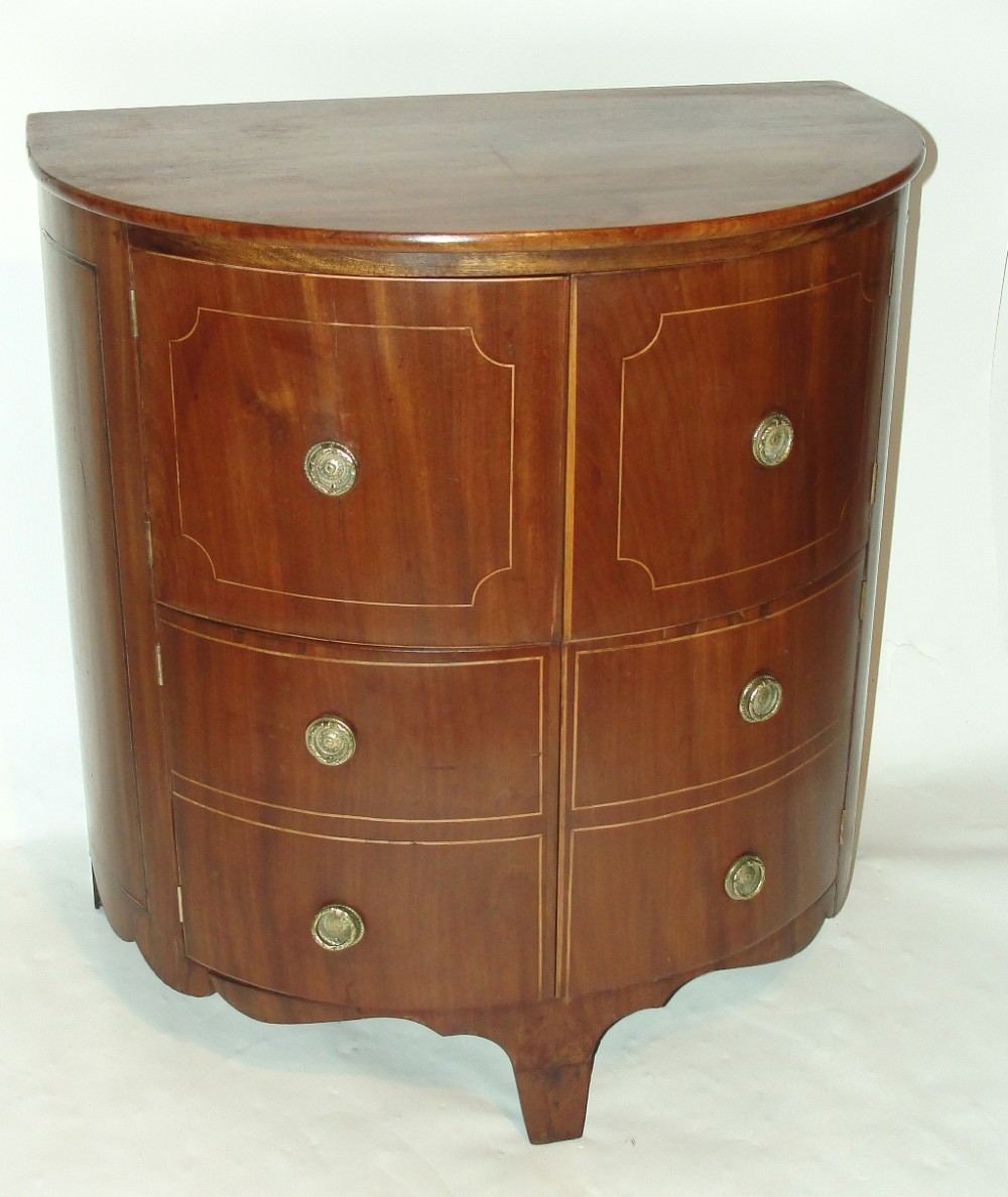 Georgian mahogany half round commode cabinet. Circa 1790