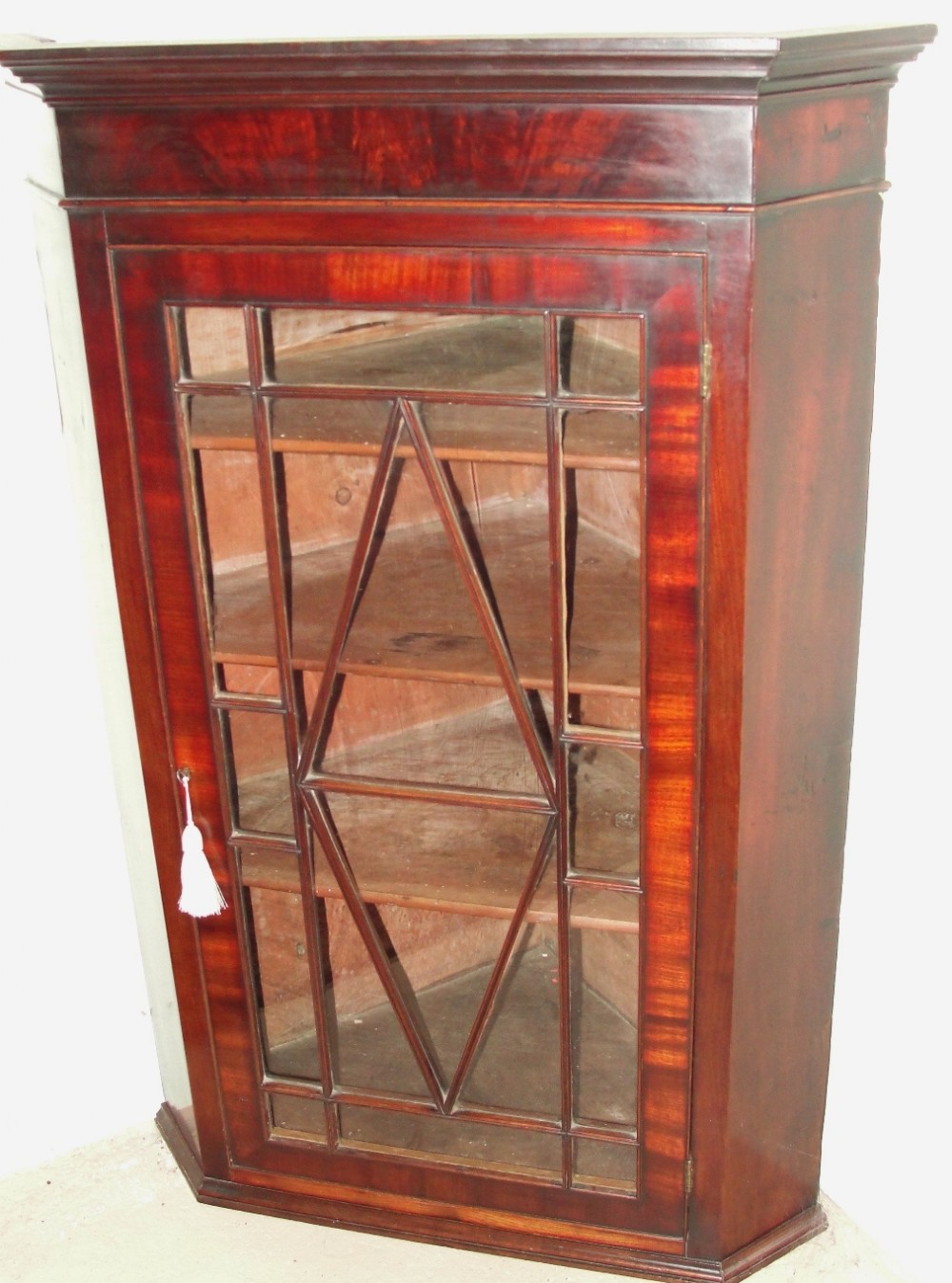 Georgian mahogany corner cabinet. Circa 1800