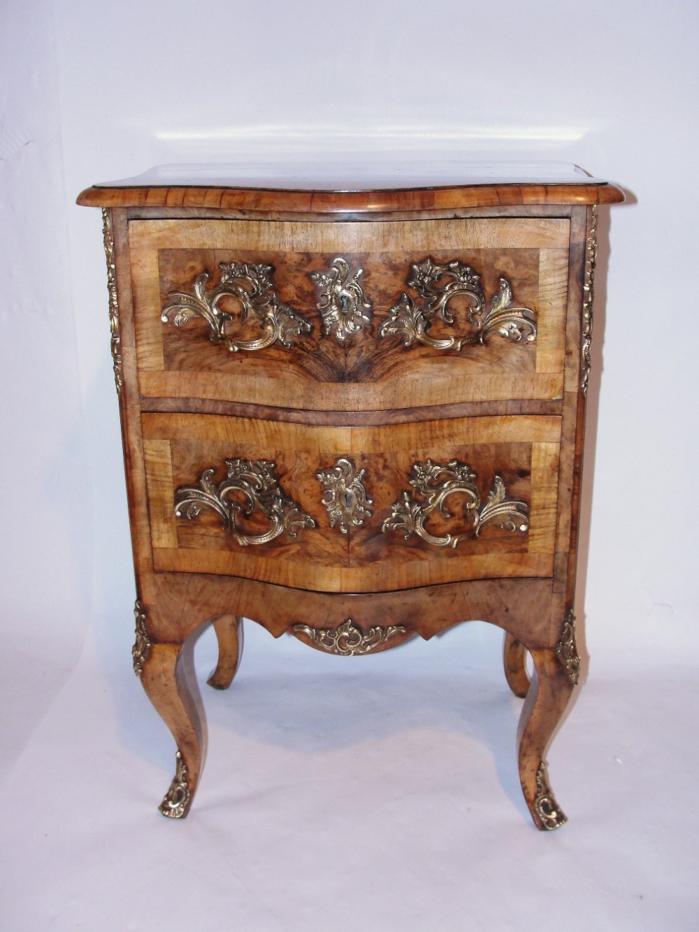 Austrian burr walnut & ormulu mounted petit commode. Circa 1850