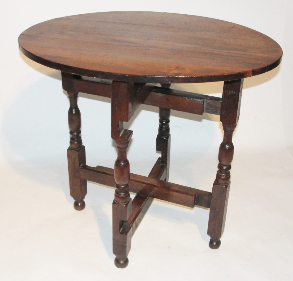 Early oak folding coaching table. Circa 1720