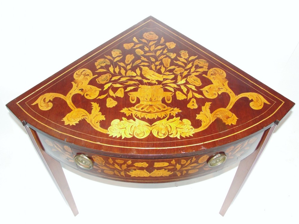 Dutch marquetry on mahogany corner side table.Circa 1810