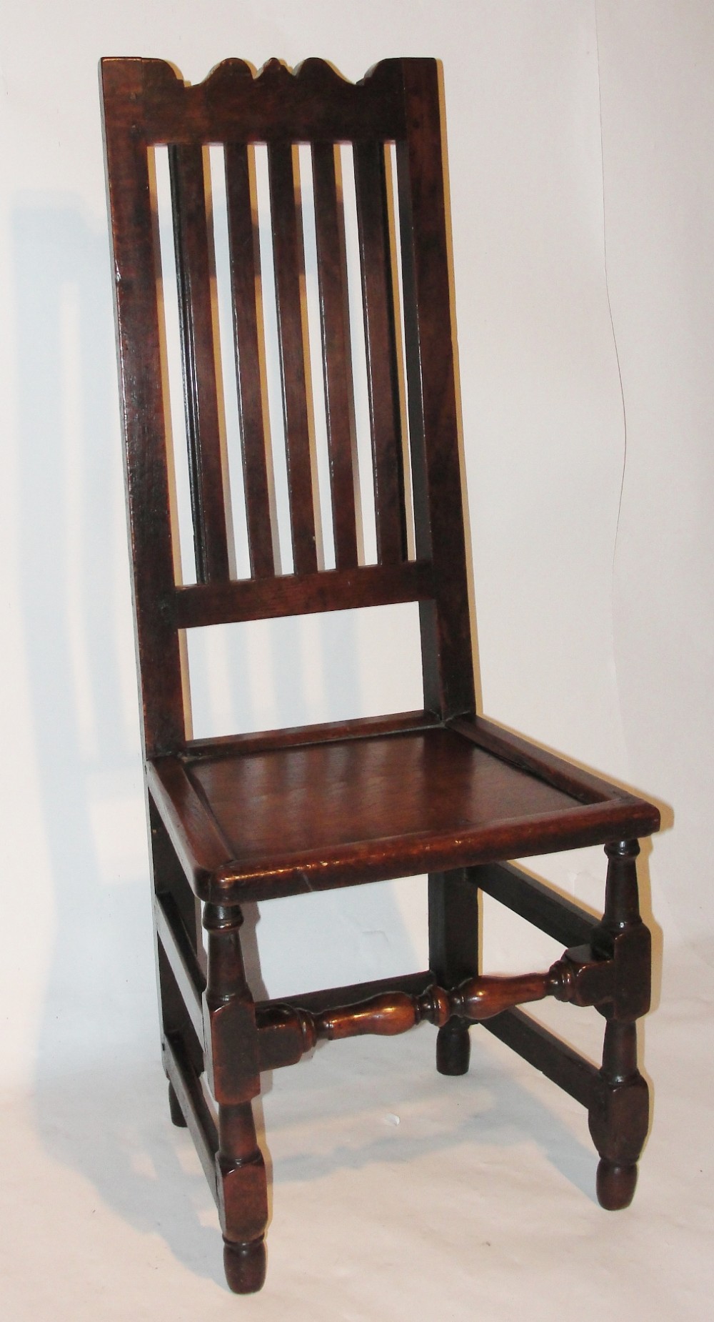 Stuart oak high back chair. Circa 1680