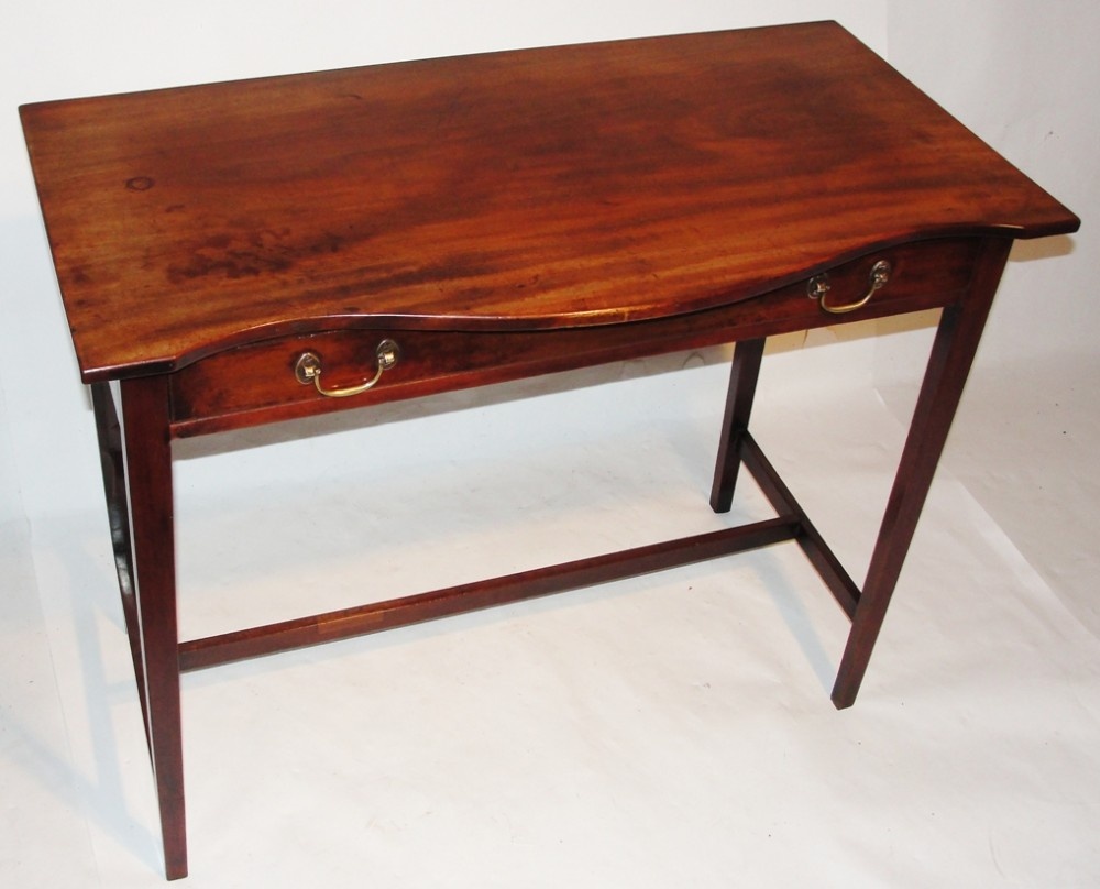 Georgian mahogany serpentine side table. Circa 1770