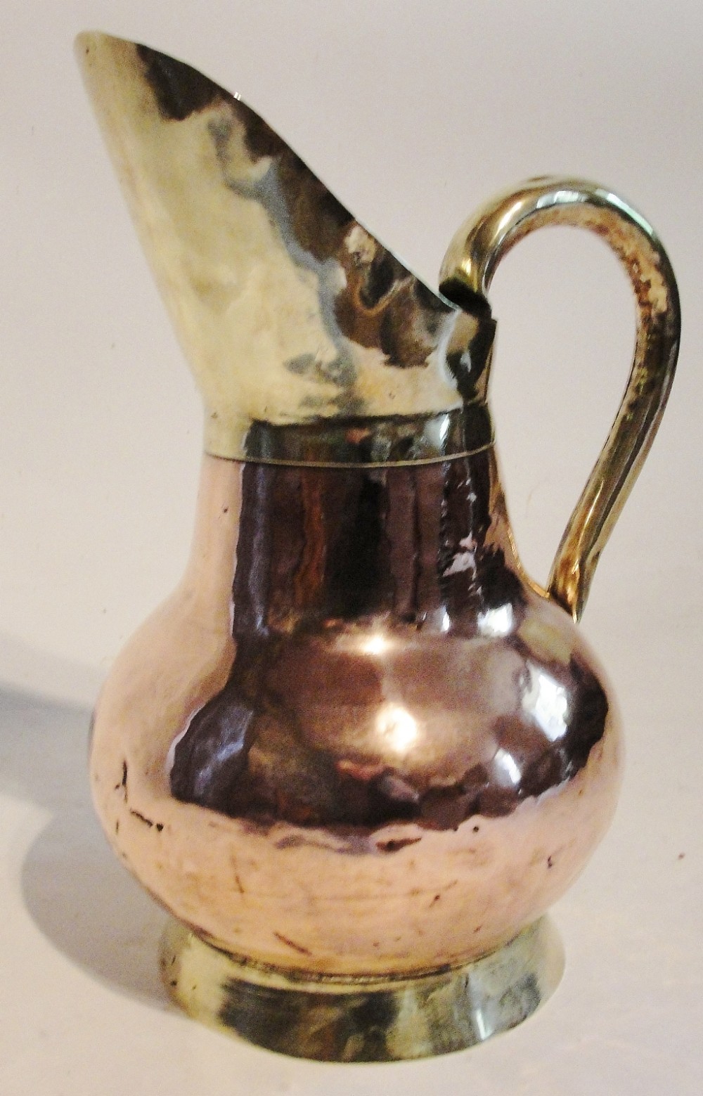 Large Victorian copper and brass jug. Circa 1870