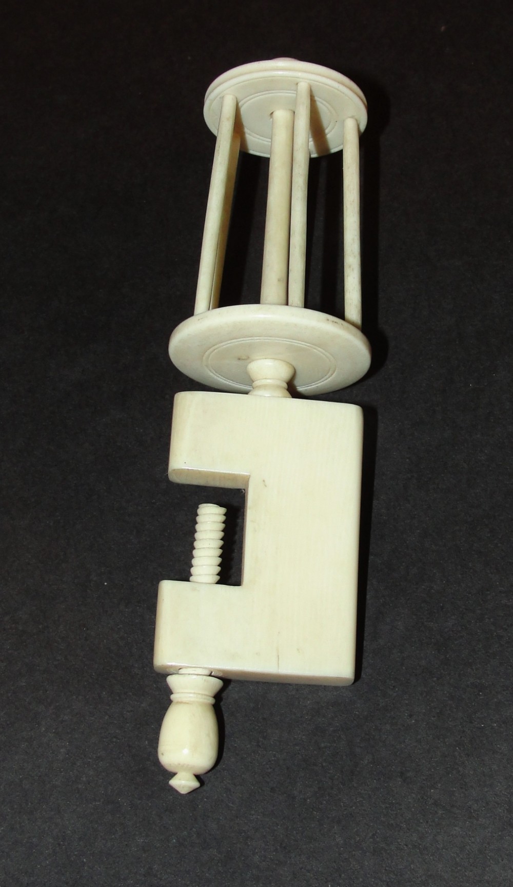 Victorian bone clamp silk bobbin. Circa 1870