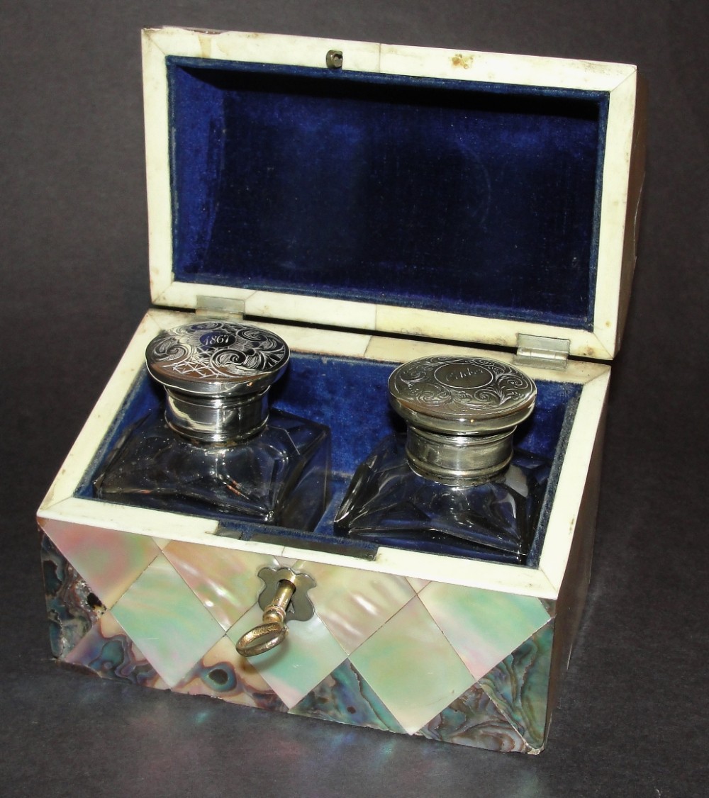 Victorian mother of pearl and abalone bottle box. Dated 1867