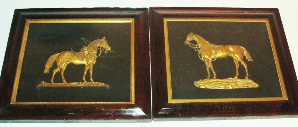 Pair regency bas relief gilded horses, rosewood frames. Circa 1830
