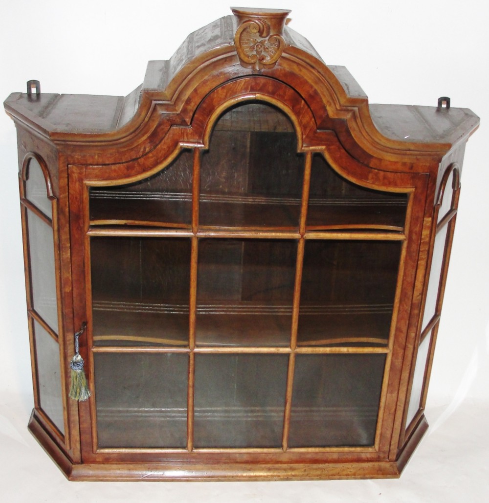 Dutch walnut hanging cabinet. Circa 1780