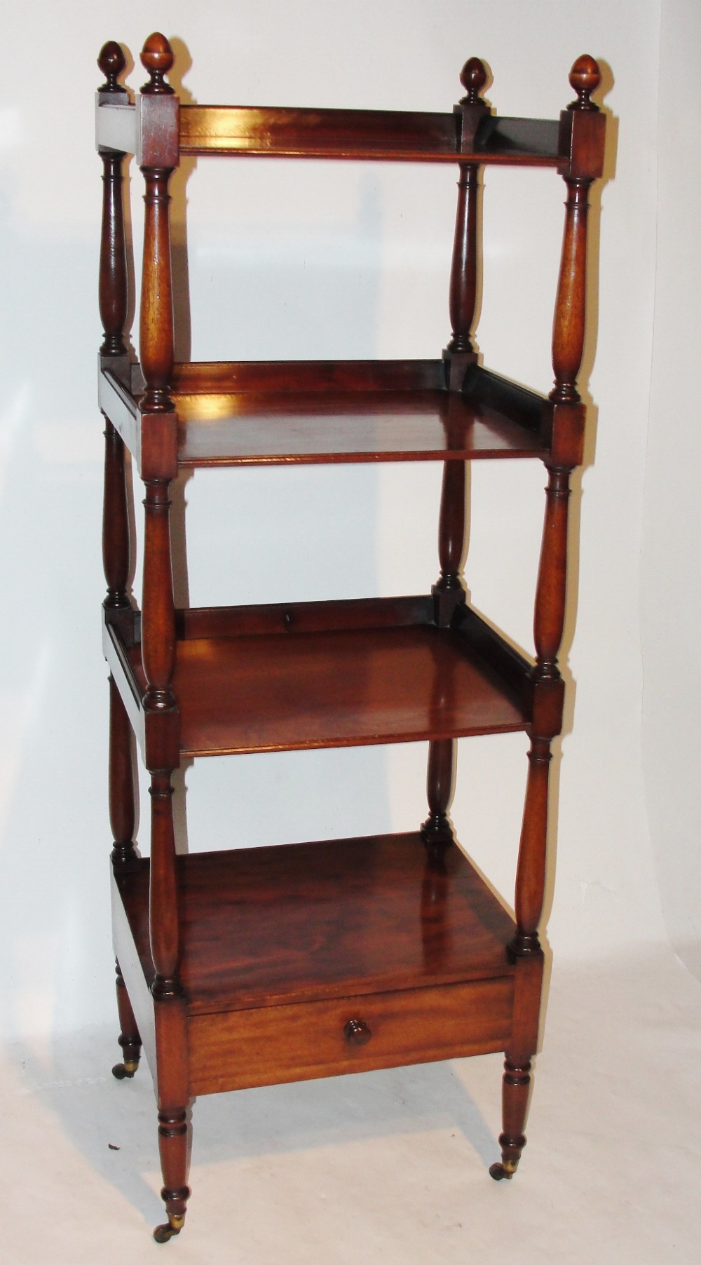 Georgian mahogany four tier whatnot. Circa 1810