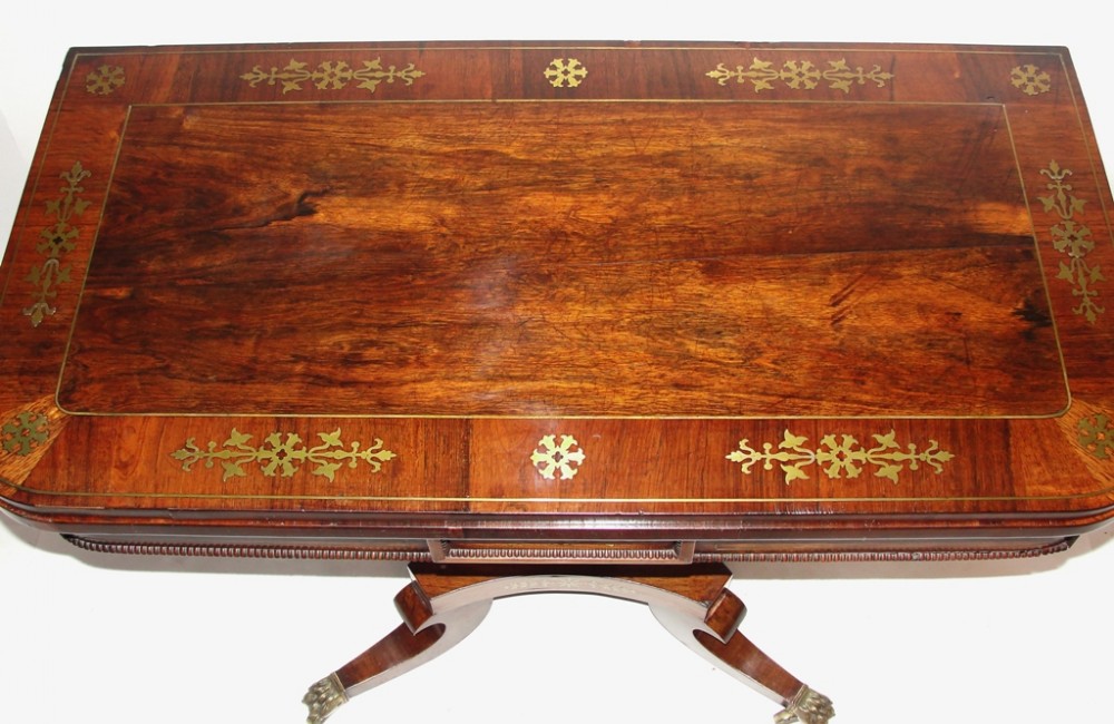 Regency rosewood brass inlaid card table. Circa 1820