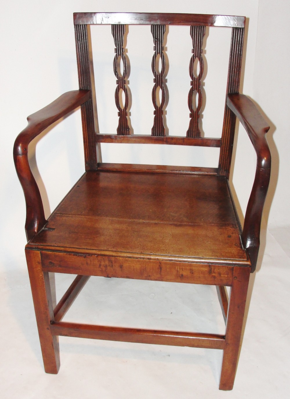 Georgian fruitwood elbow chair. Circa 1780