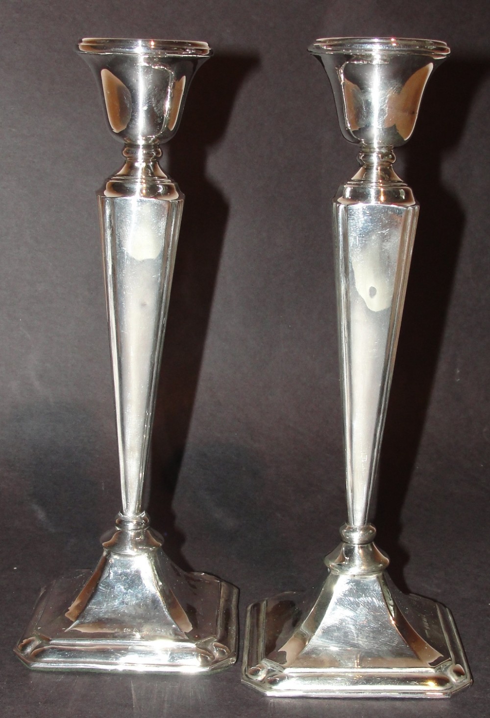Pair weighted silver candlestick. 1919