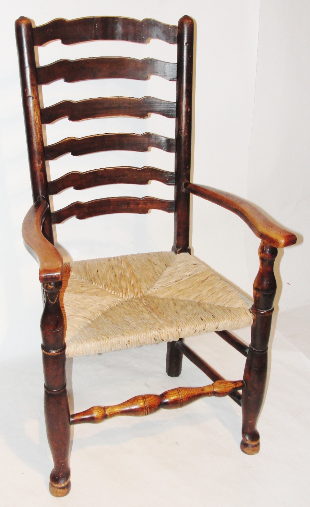 Georgian elm and fruitwood ladder back armchair  Circa 1820