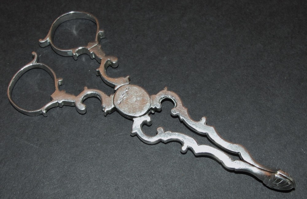 Georgian silver sugar nips. Circa 1755