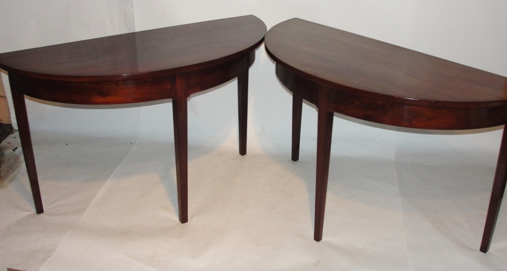 Pair Georgian half round side tables. Circa 1800