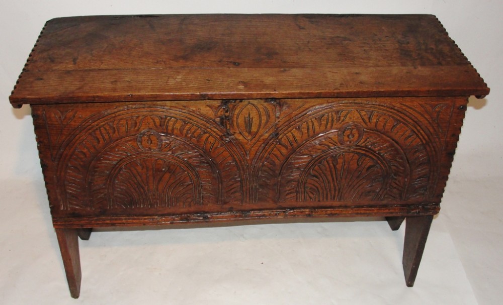 Early oak carved gun chest. Circa 1670