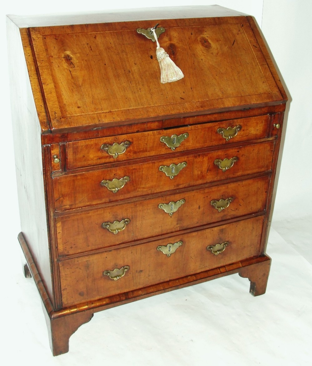 Small George II walnut bureau. Circa 1740