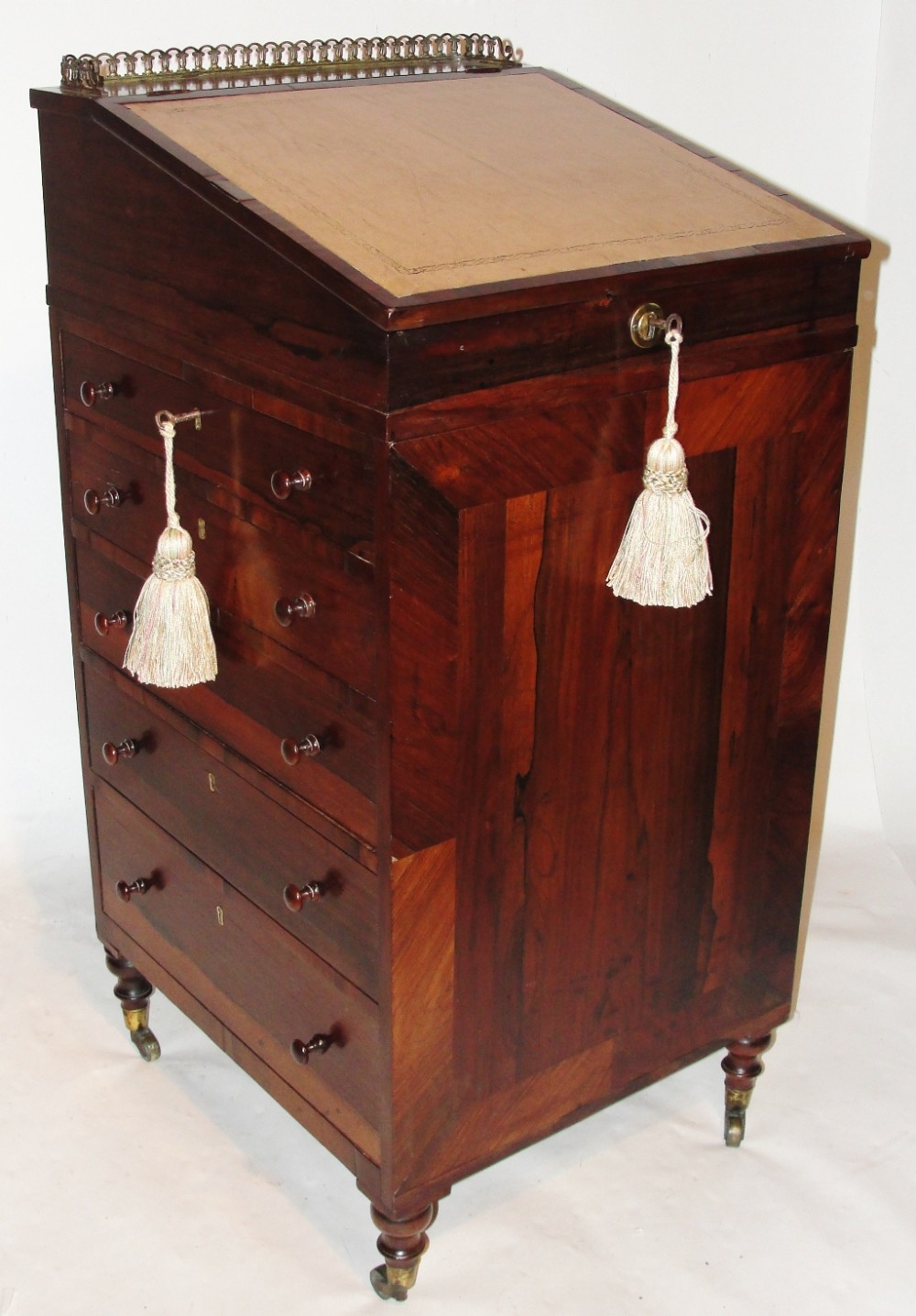 Small Regency rosewood davenport. Circa 1815