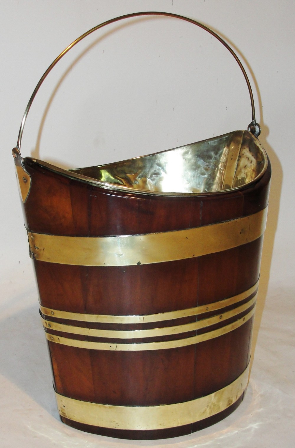 Georgian brass bound boat shaped bucket. Circa 1780