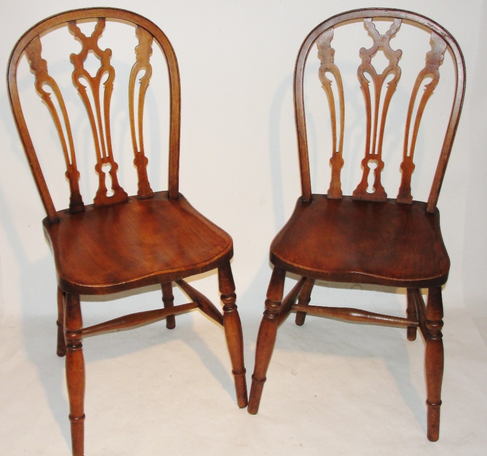 Pair Victorian beech windsor chairs. Circa 1880