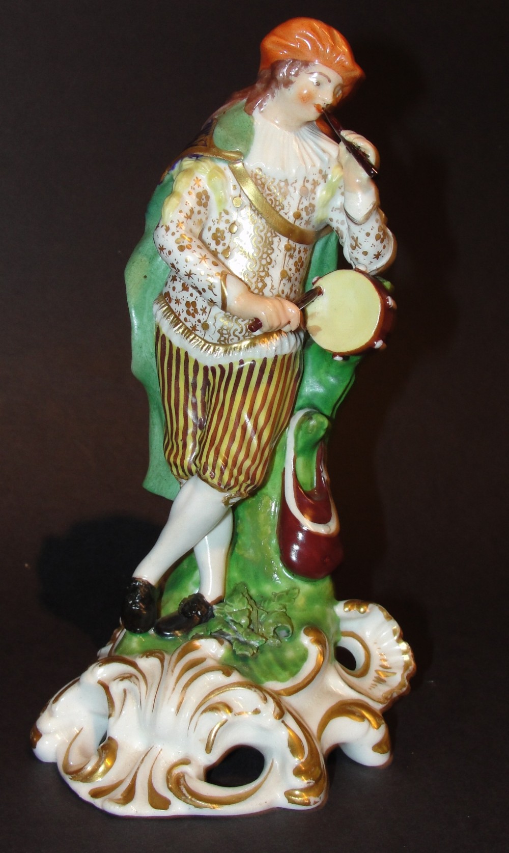 Derby porcelain figure of musician. Circa 1810