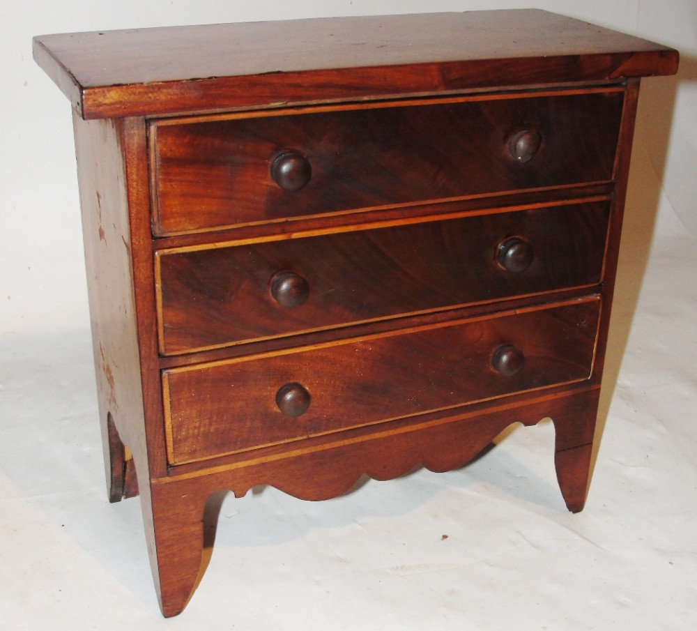 Georgian miniature chest of drawers. Circa 1820
