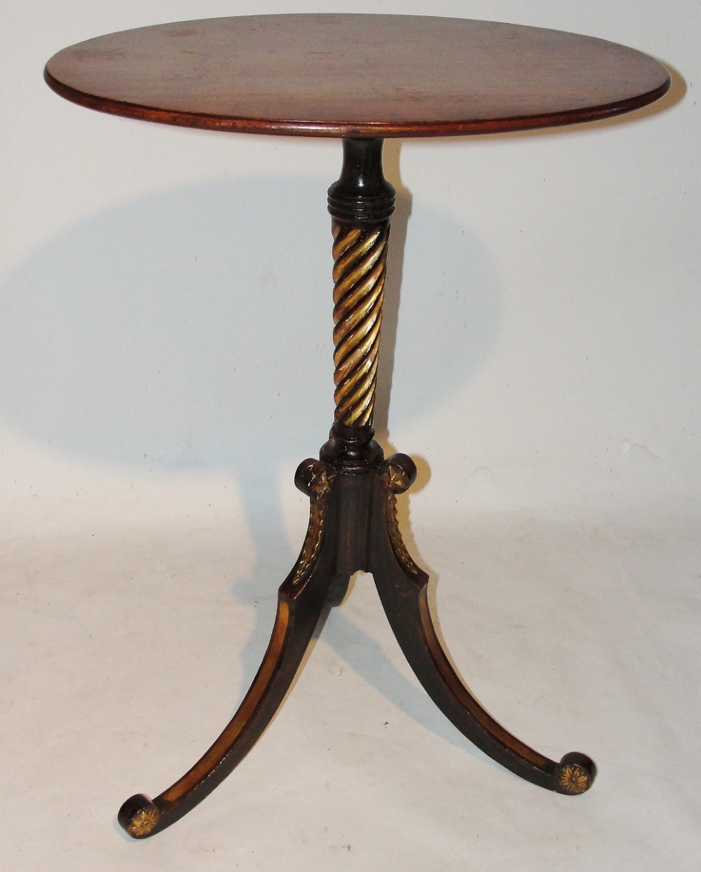 Regency simulated rosewood & gilt tripod table with mahogany top. Circa 1810
