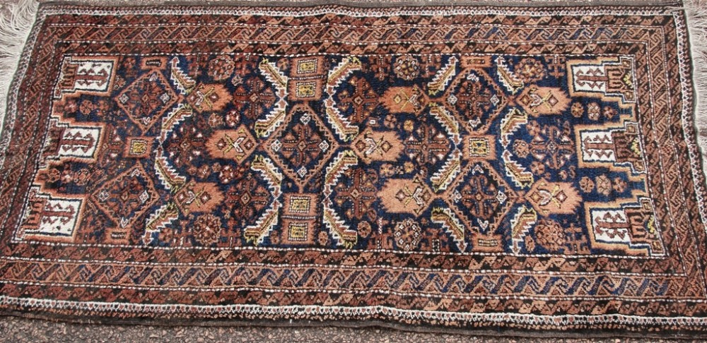 Antique Persian Balouche rug. Circa 1920