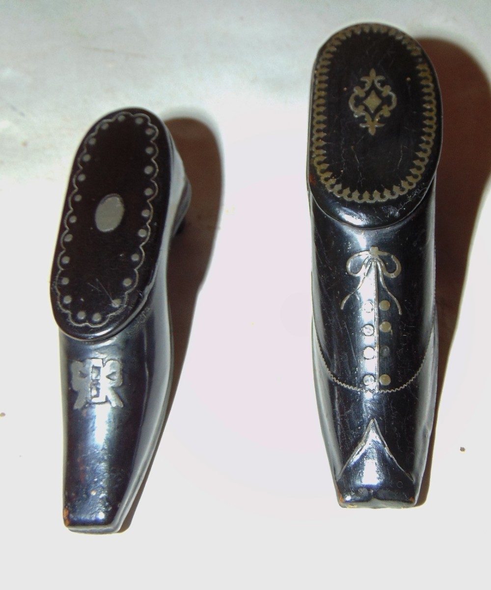 Two Victorian papier mache snuff shoes. Circa 1850