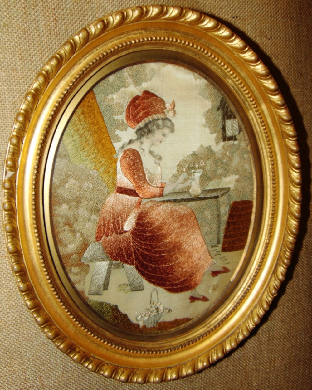 Georgian oval silkwork picture. Circa 1820