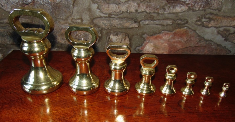 Set 8 Victorian dump weights. Circa 1870