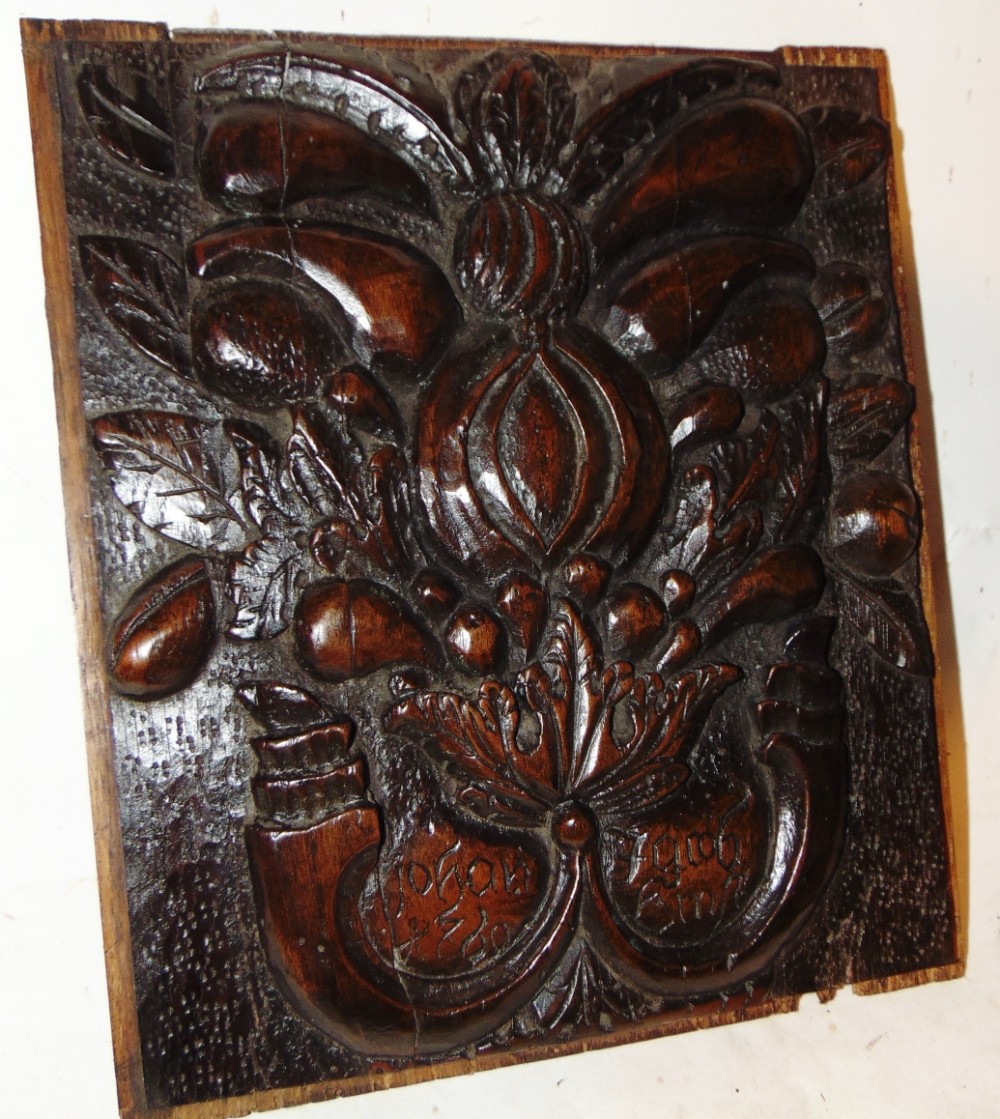 Dutch carved walnut panel. Dated 1760