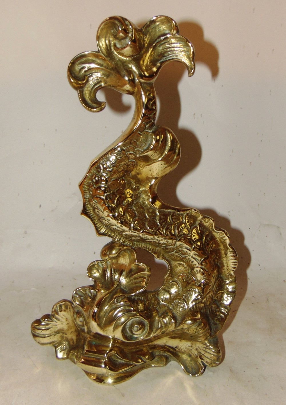 Victorian brass dolphin door stop. Circa 1860