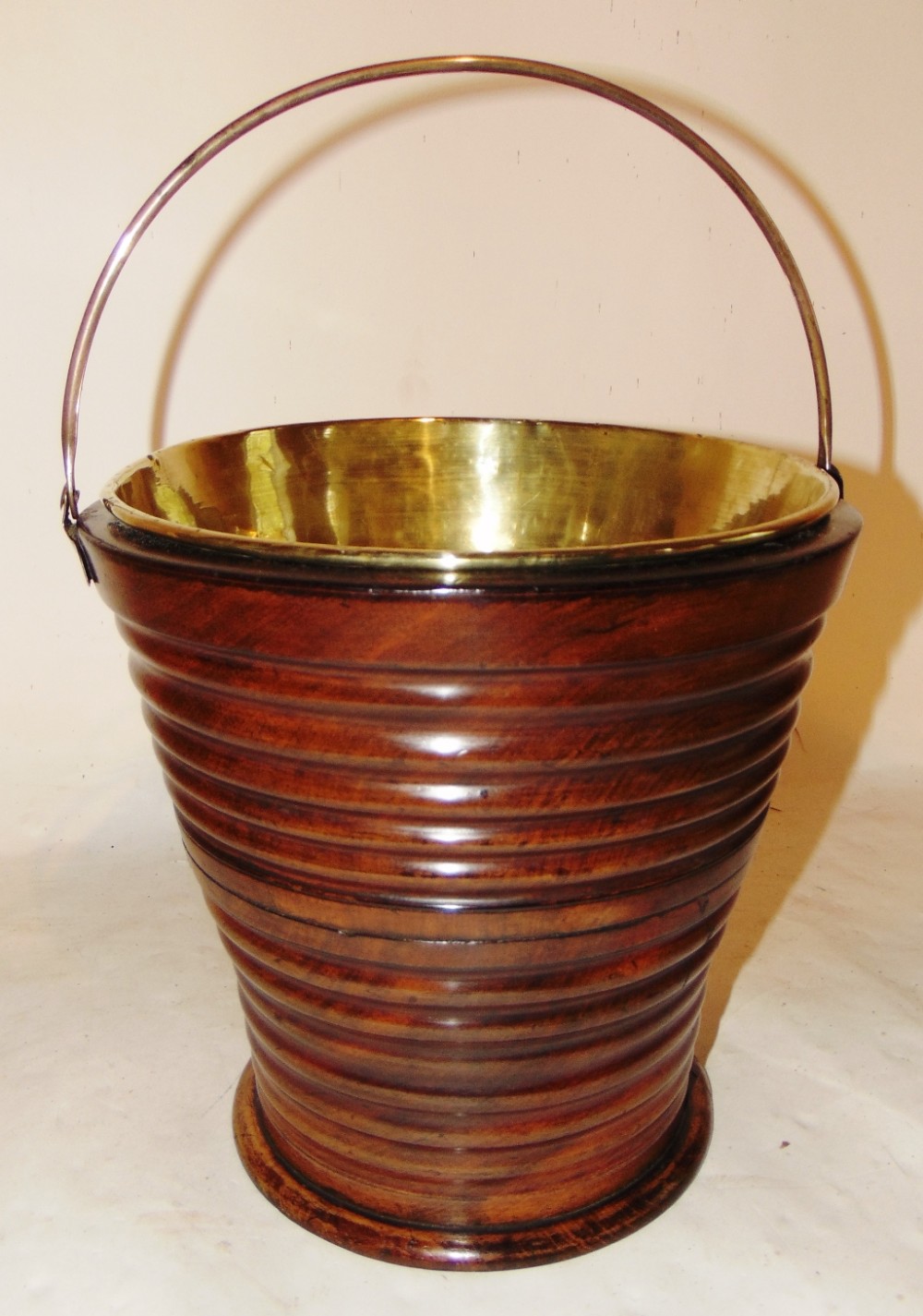 Dutch turned mahogany ribbed bucket. Circa 1790