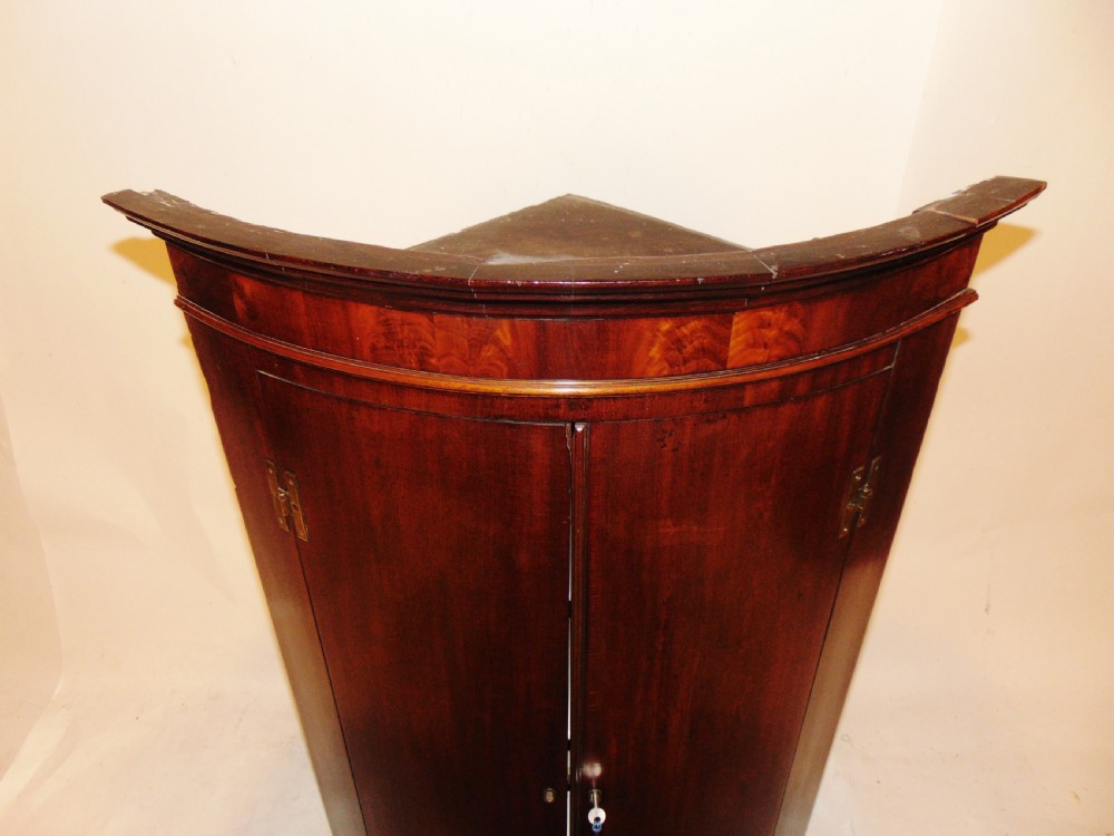 Georgian mahogany bow fronted corner cabinet Circa 1770 View II