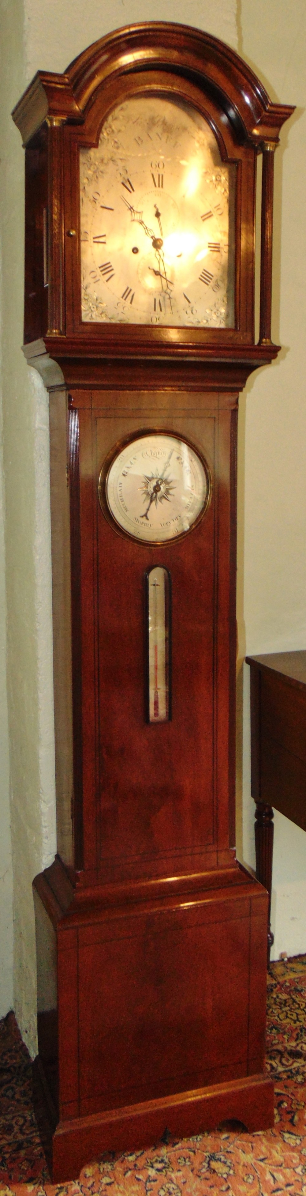 Scottish mahogany longcase clock with barometer. Circa 1800