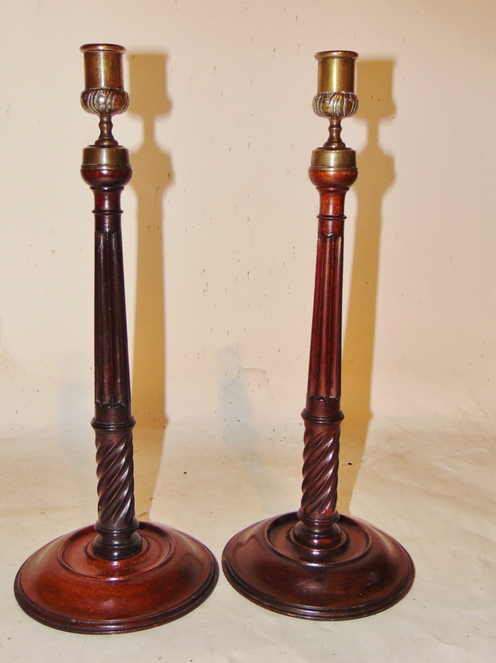 Pair Georgian mahogany candlesticks. Circa 1800