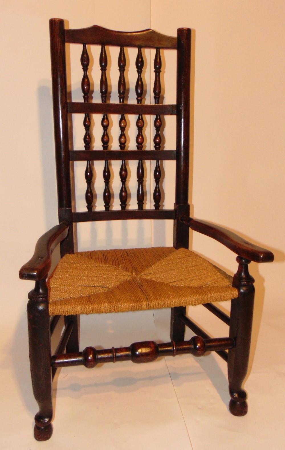 Lancashire elm spindle back nursing chair. Circa 1820