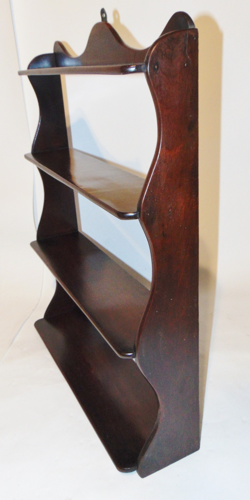 Georgian mahogany hanging shelves. Circa 1770
