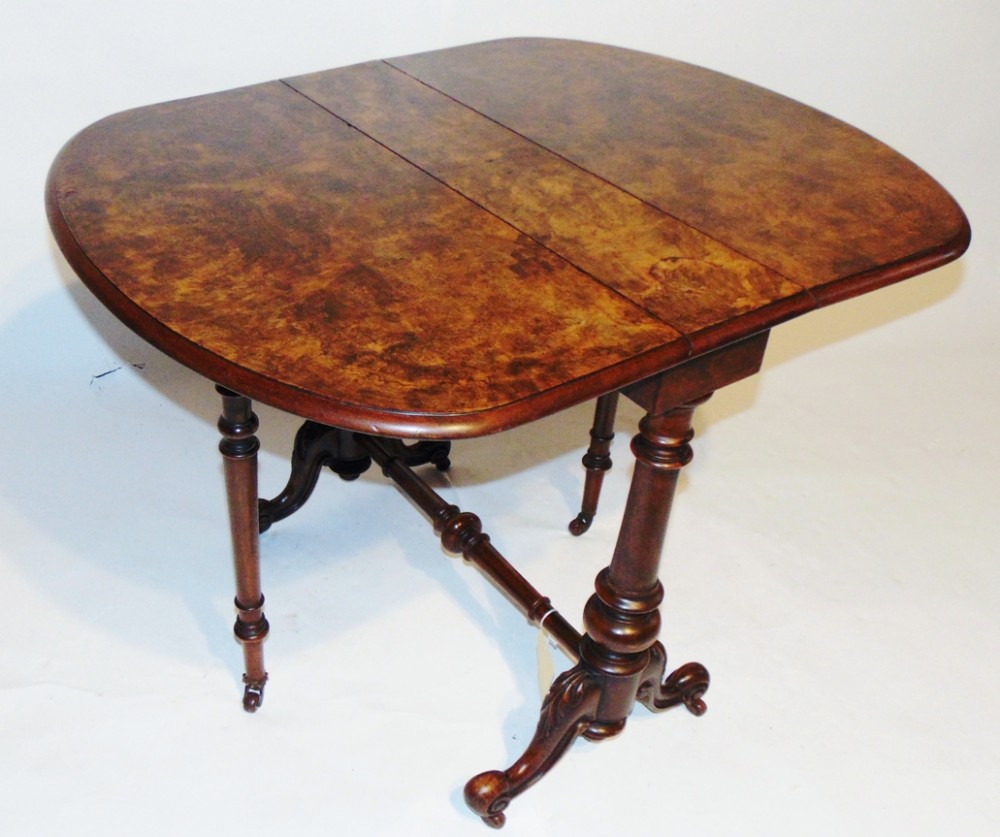 Victorian walnut sutherland table. Circa 1850