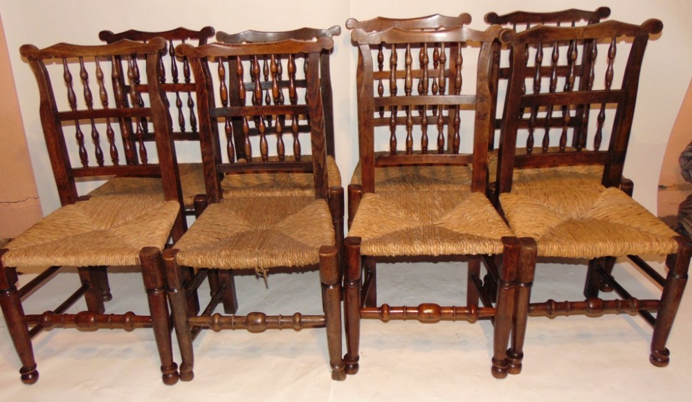 Set 8 Georgian Lancashire spindle back rush seat chairs Circa 1820