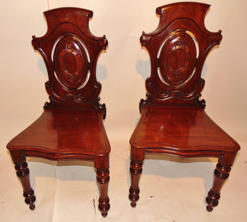 Pair early Victorian mahogany hall chairs circa 1845