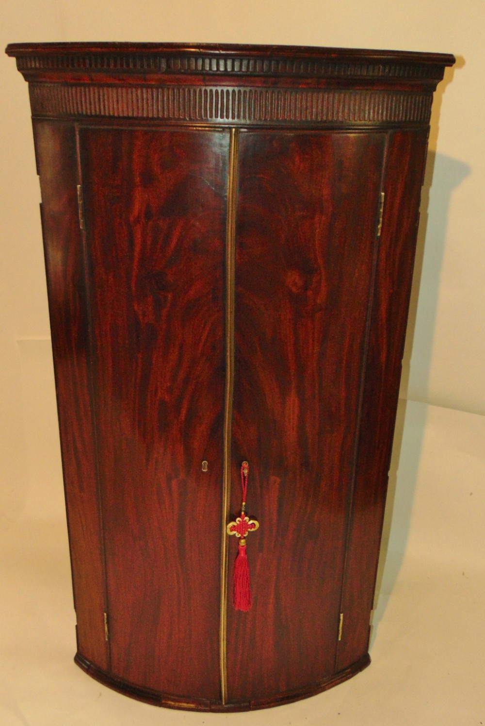 Georgian bow fronted hanging corner cabinet circa 1775