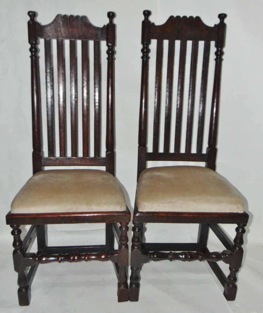 Pair Jacobean oak high back chairs circa 1680