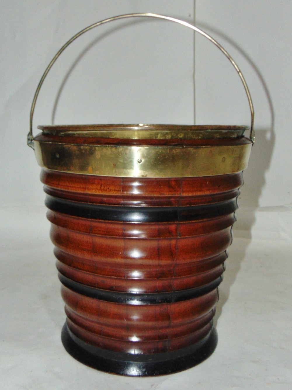 Dutch coopered and turned mahogany bucket circa 1820