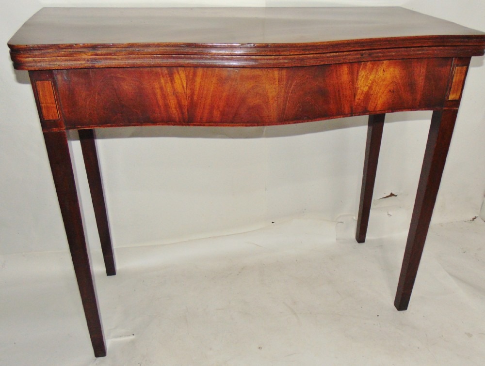 Georgian mahogany serpentine tea table circa 1790