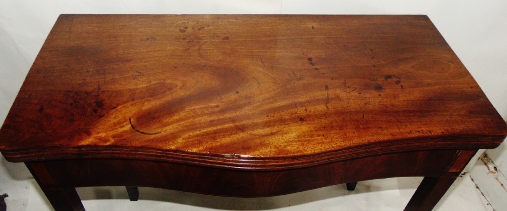 Georgian mahogany serpentine tea table circa 1790 View III